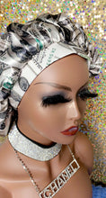 Load image into Gallery viewer, Multi Green Dollar Sign Satin Bonnet
